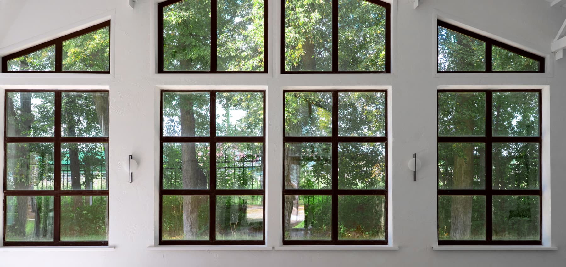 room_with_white_walls_and_large_windows